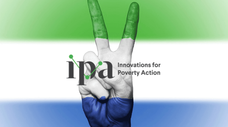 A hand giving the peace sign is overpaid on an illustration of the Sierra Leone flag. Over the middle of the hand, the logo for Innovations for Poverty Action (IPA) is displayed.