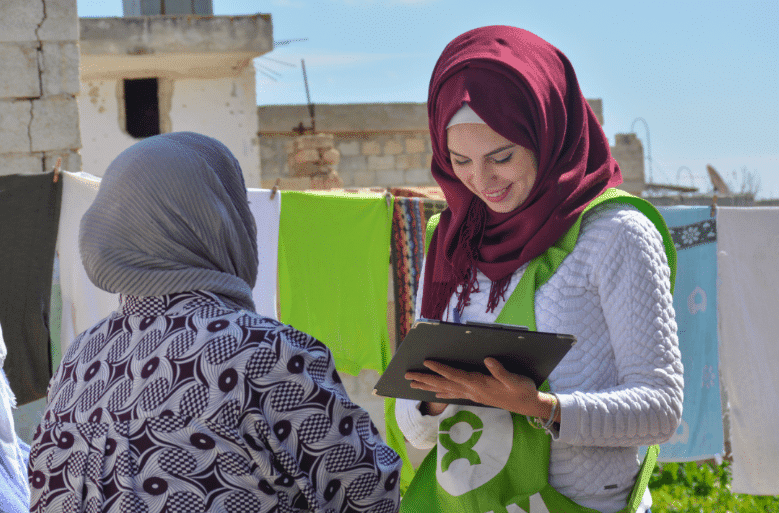 oxfam enumerator collecting data